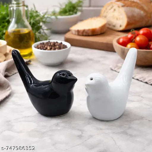 Bird design salt pepper dispenser black white