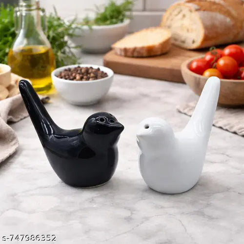 Bird design salt pepper dispenser black white