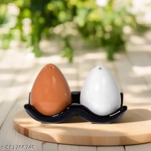 Egg-shaped ceramic salt pepper shaker set with holder